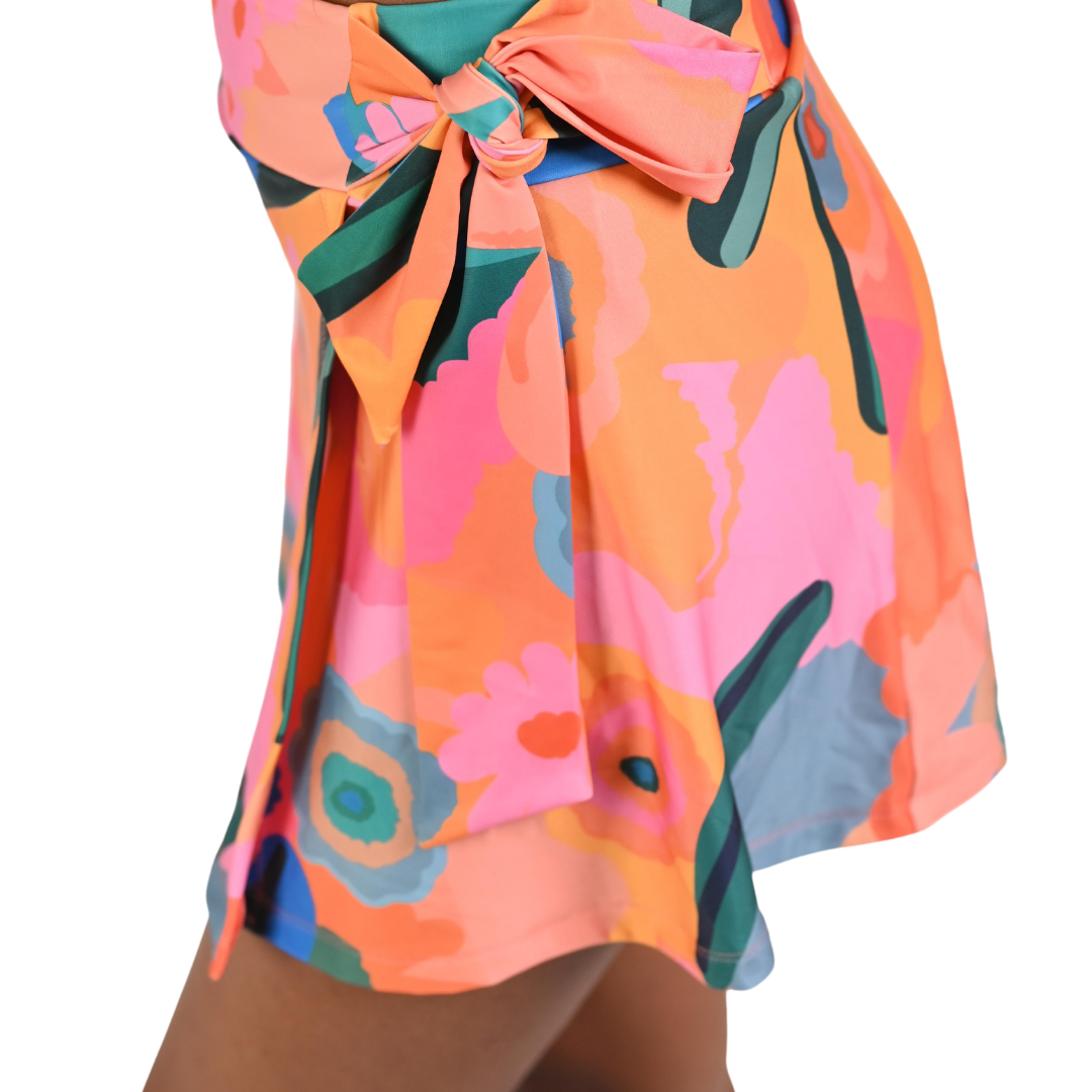 Close-up of the adjustable side tie on the TFW Pink Infusion swim skort